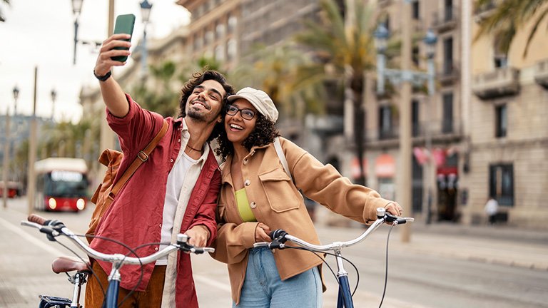 A-couple-traveling-with-bikes-enjoying-best-esim-for-europe