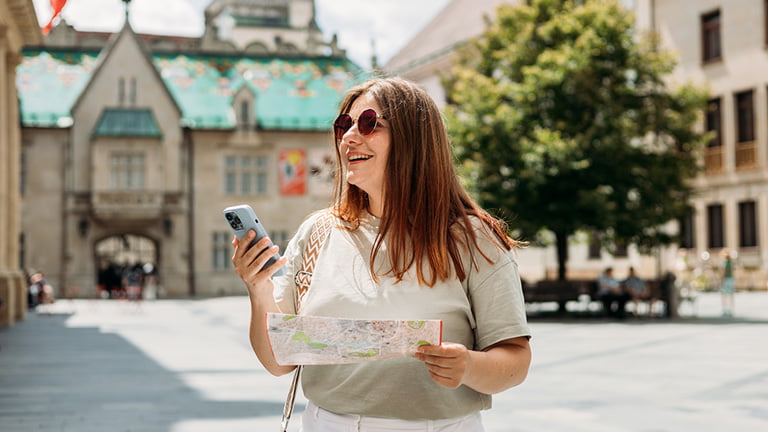 A-female-traveler-finding-her-way-with–esim-europe-travel